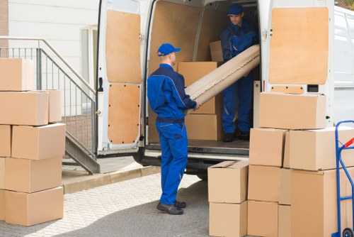 Professional house removals planning in Queenspark with moving boxes and furniture