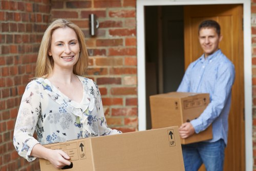 Charity donation boxes and furniture prepared for reuse after removals