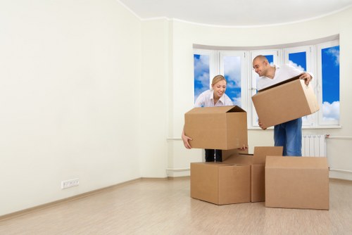 Efficient moving team handling boxes in Queenspark