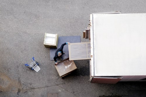 Students planning a move in Queenspark with a removals van