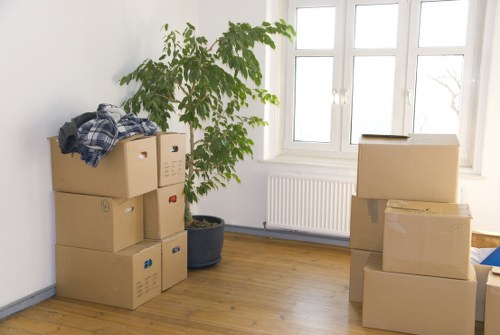 Commercial movers handling office equipment during relocation in Queenspark