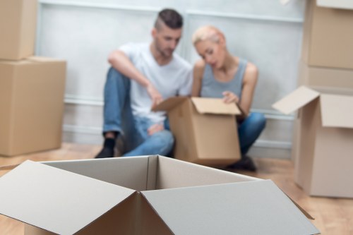 Packed boxes and moving supplies prepared for a Queenspark relocation