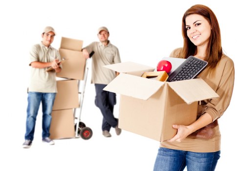 Furniture and boxes being unloaded at a new Queens Park property