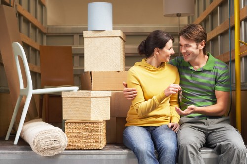 Professional movers handling a home relocation in Queenspark