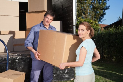 Packed boxes and furniture prepared for a local removals job